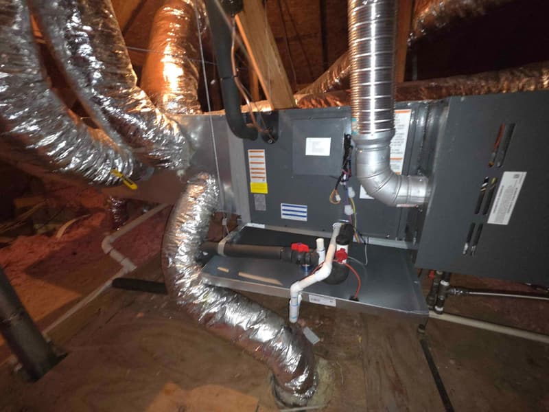 Horizontal gas furnace and evaporator coil in an attic, with flex duct runs